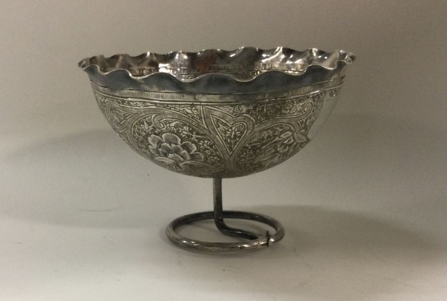 An Asian silver bowl with unusual foot. Approx. 66