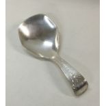 A George III bright cut silver caddy spoon. London