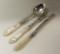 A fine three piece silver and MOP christening set.