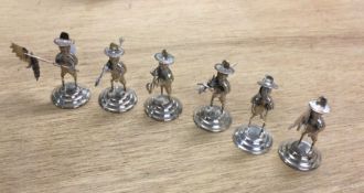 A set of six Chinese silver figures of men. Approx