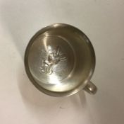 An American silver christening mug decorated with