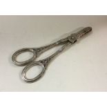 A pair of heavy cast silver grape scissors. Birmin