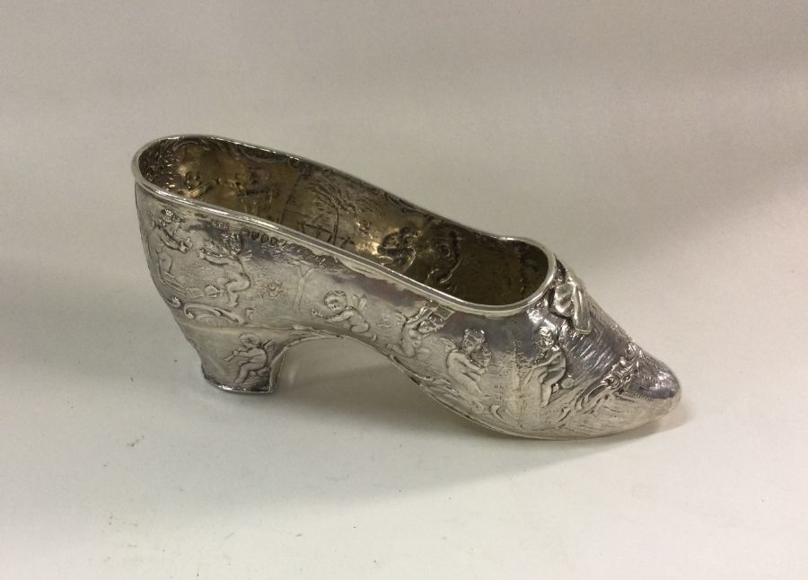 A heavy chased silver miniature model of a shoe, b - Image 2 of 2