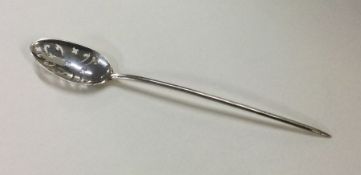 An 18th Century silver mote spoon. Maker's mark st