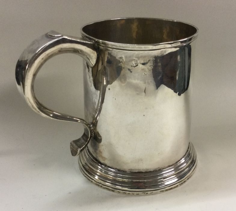 A large George II silver pint tankard. London 1735