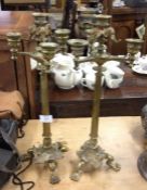 A pair of Antique brass candlesticks.