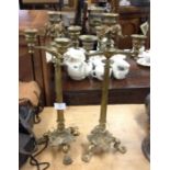 A pair of Antique brass candlesticks.