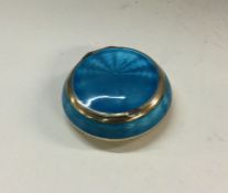 A silver and blue enamelled box bearing import mar