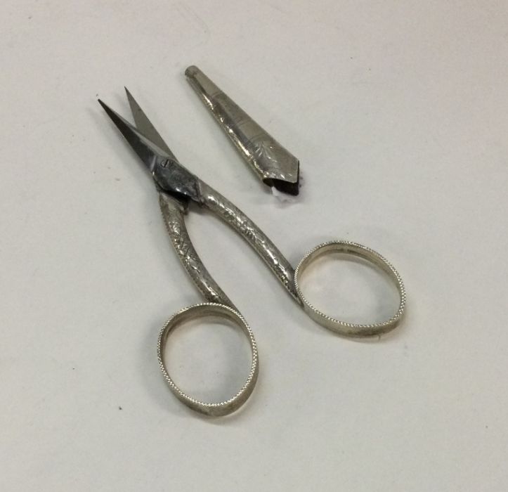 A pair of George III silver scissors in original s