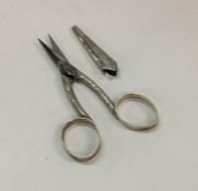 A pair of George III silver scissors in original s
