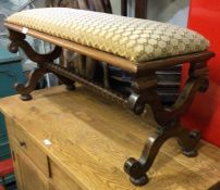 A Victorian mahogany stool.