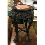 A good Chinese hard wood table with marble inset.