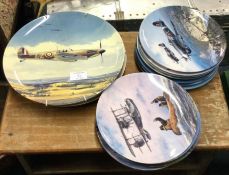 A quantity of old collectors' plates.