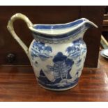 A large Chinese blue and white jug.
