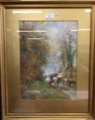 A gilt framed watercolour depicting cattle. Signed to bottom left. Approx