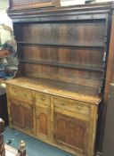 An Antique oak dresser.