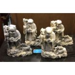 Four Chinese soapstone figures.