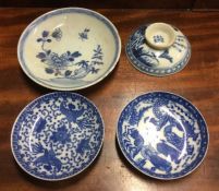 Four Chinese blue and white dishes.