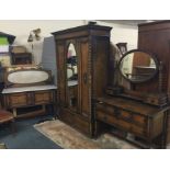 An oak three piece bedroom suite.