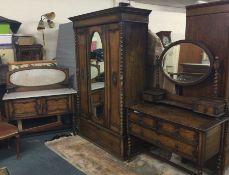 An oak three piece bedroom suite.