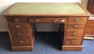 A mahogany twin pedestal desk.