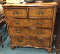 A good burr walnut chest of five drawers.