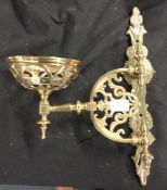 An old brass oil lamp holder.