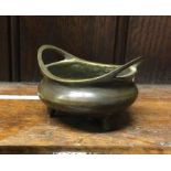 A small Chinese two handled bowl. Marked to base.