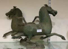 A pair of wooden horses.