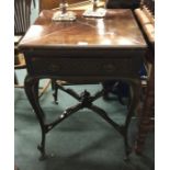 An Edwardian mahogany envelope card table.