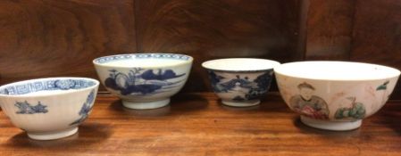 Four Chinese blue and white tea bowls.