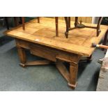 A large hardwood occasional table with drawer.