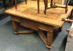 A large hardwood occasional table with drawer.