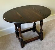 A small oak drop leaf table.