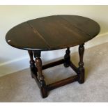 A small oak drop leaf table.