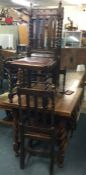 An oak barley twist table and four chairs.