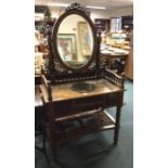 A good hardwood dressing table of Oriental design.