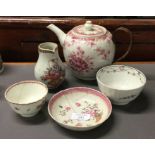 A good Chinese cream jug together with other potte