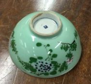 A decorative Chinese bowl in green ground.