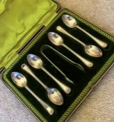 A box set of silver teaspoons.