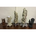 Five carved Oriental figures.