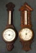 Two oak barometers.