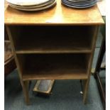 A stripped pine wall shelf.