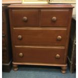A mahogany chest of four drawers.