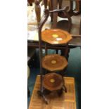 A cake stand together with a retro table.