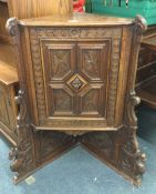 A good oak carved corner unit.