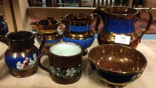 A collection of lustre pottery ware.