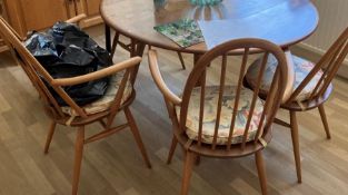 ERCOL: A good Ercol kitchen table and four chairs.