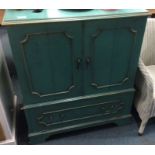 A retro blue TV cabinet.