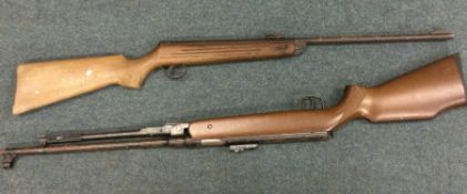 Two air rifles.